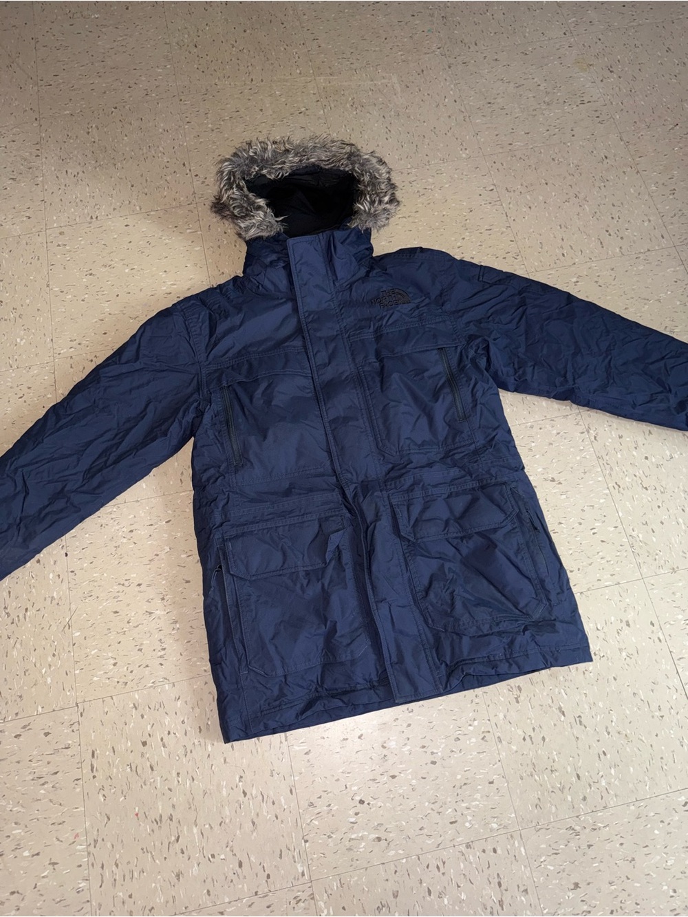 The North Face Men navy blue coat. Size M